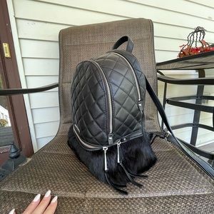 Brand new - never used - Black Leather Michael Koran backpack with black fur